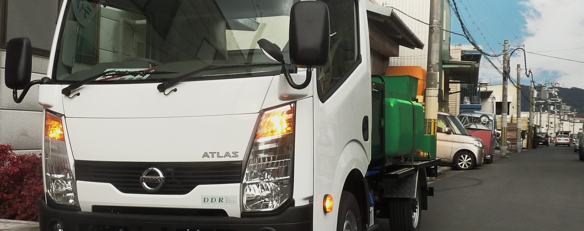 けんさん　散布車 自社オリジナル散布車輛 : 有限会社エスケージー